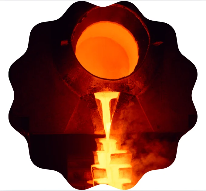 Molten metal pouring in a glowing stream from a tilting induction furnace crucible